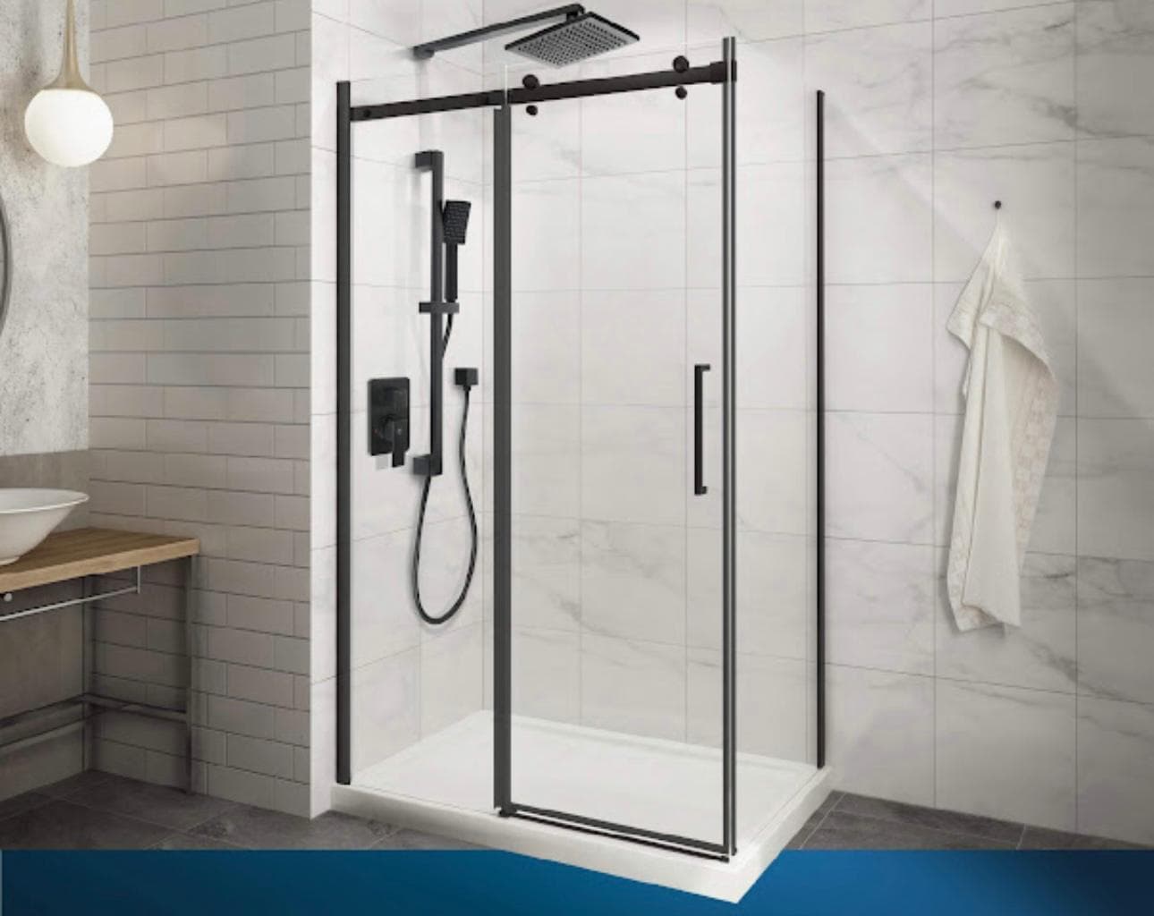 Sliding glass shower enclosure with matte black hardware